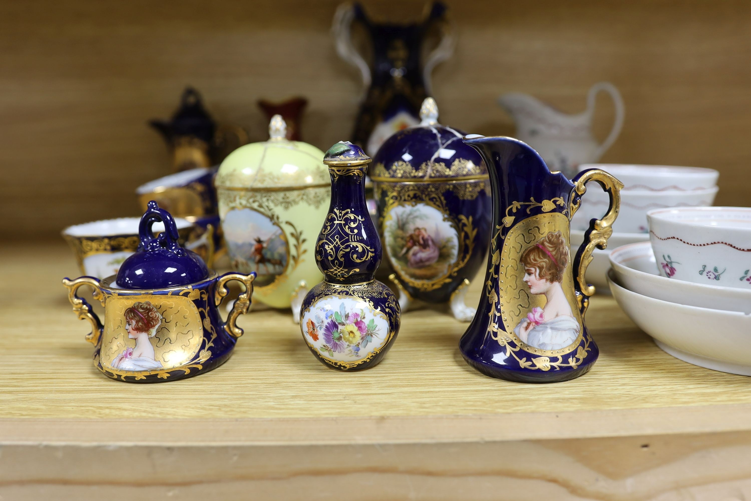 A selection of 19th century porcelain including Meissen cups, covers and saucers, Newhall type bowls and saucers and others